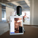 Image of a leica blk360 imaging laser scanner & a tablet running the cyclone software