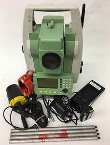 image of a used leica ts06 total station along side its accessories such as charger, prism etc